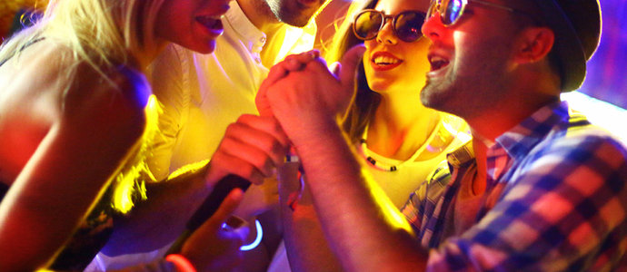 Friends singing karaoke